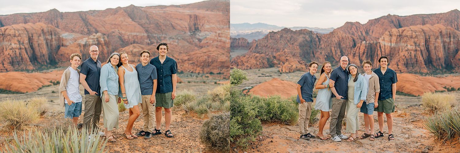Group portrait with panoramic views of red rock formations in Utah's desert landscape.