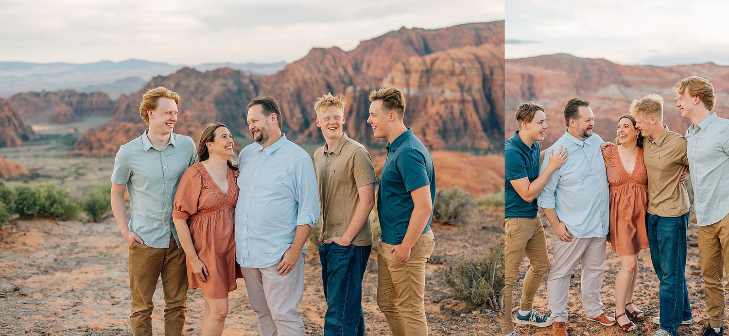 Family gathering poses together with dramatic red rock formations in the desert background.