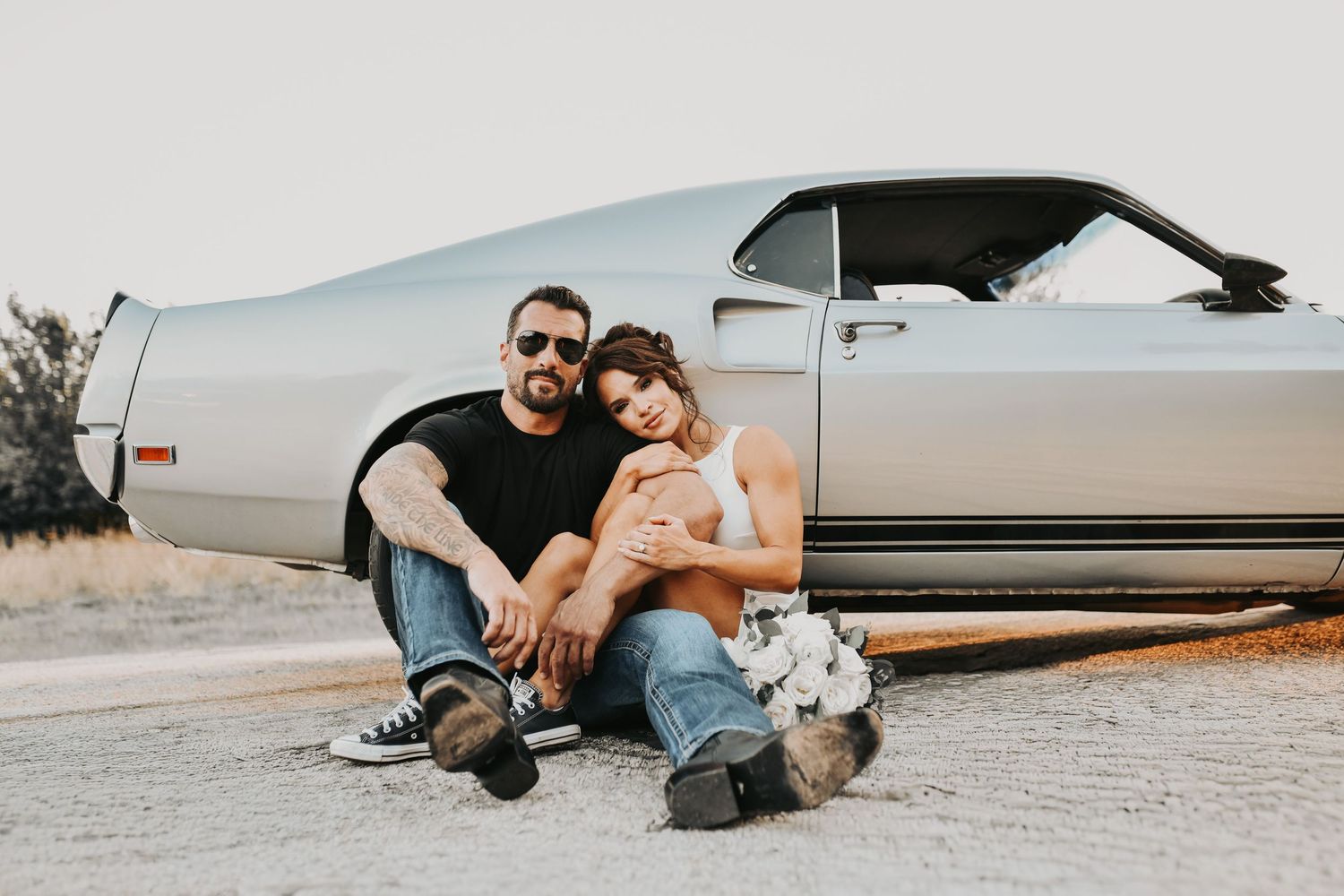 fashion forward couple engagement session with bold styling choices