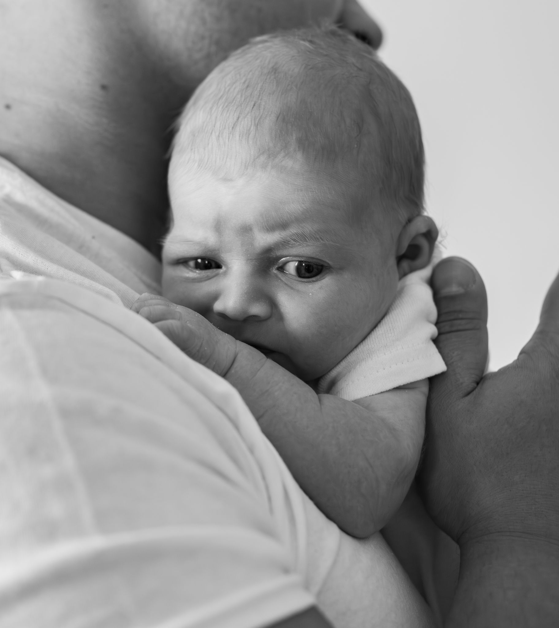 A new baby with her dad.