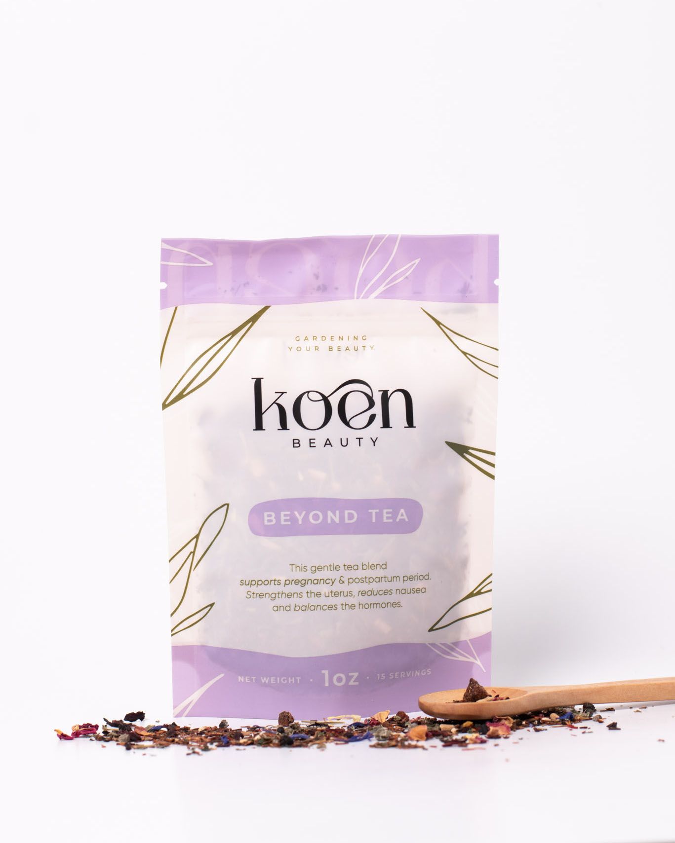 Koen Beauty Beyond Tea 1oz bag for pregnancy and postpartum support, with loose leaf tea blend and wooden spoon on white background.