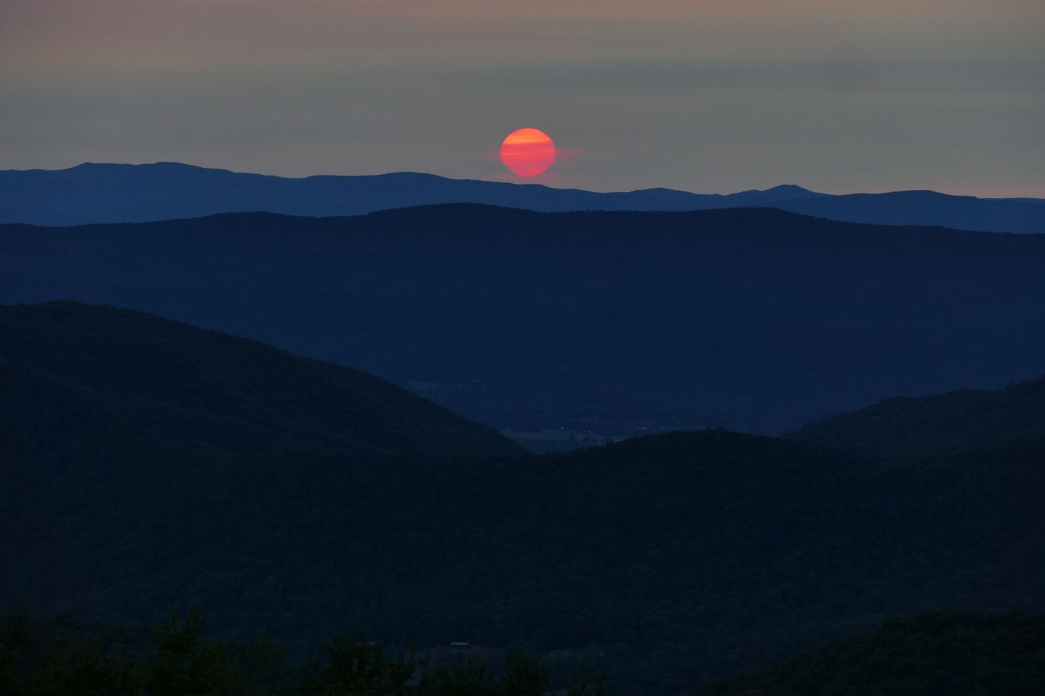 Hazy red sunset over the Shenandoah Valley Virginia