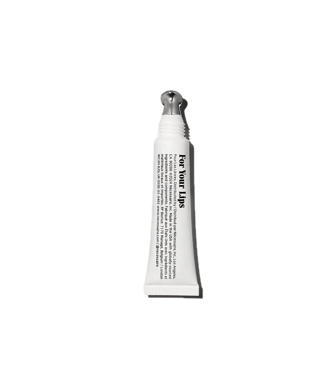 Three white skincare product tubes arranged in a minimalist composition against a light background.