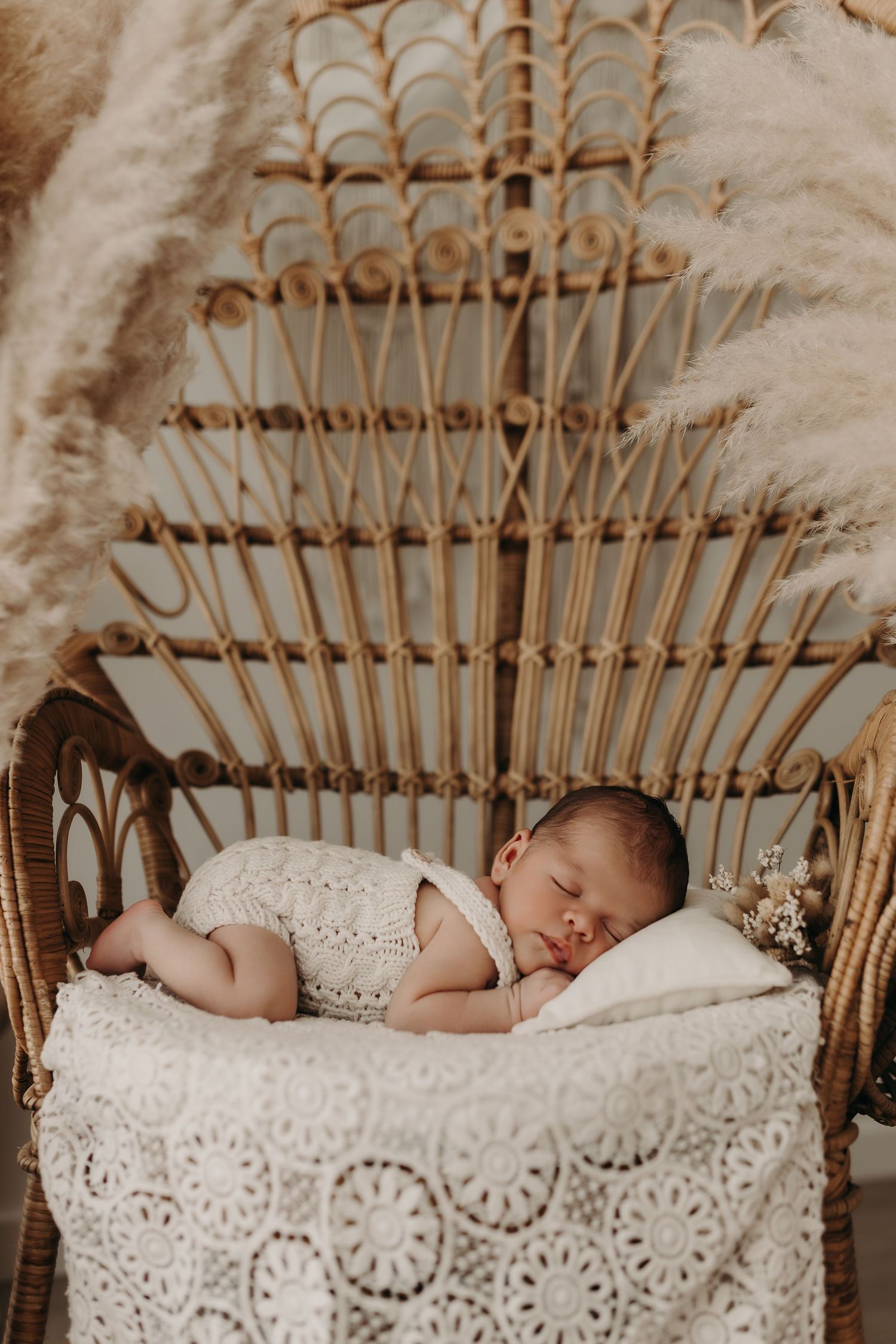 Photographie de bébé endormi réalisée en Gironde par une photographe spécialisée.
