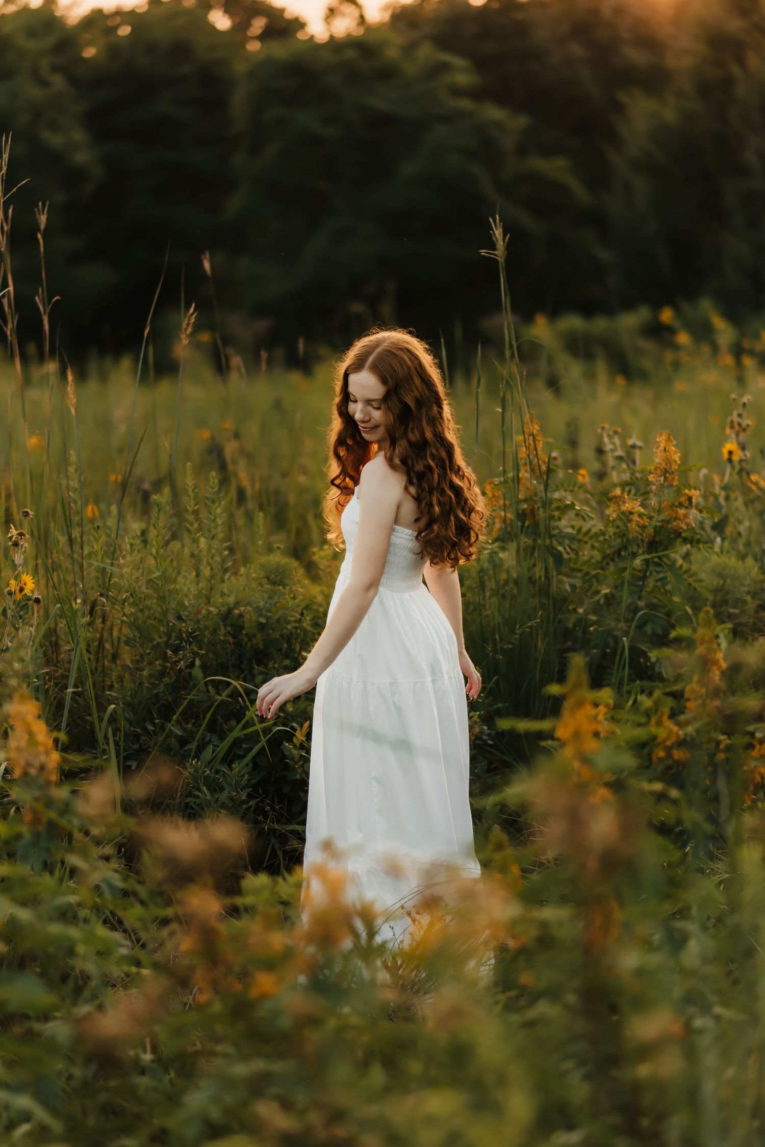 Beautiful senior photos in a field of wild flowers