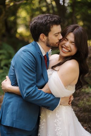 A romantic outdoor wedding photoshoot sequence showing tender moments between newlyweds in a blue suit and white dress.