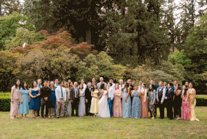 A panoramic collage of an outdoor wedding gathering with guests in formal attire standing together in a garden setting.