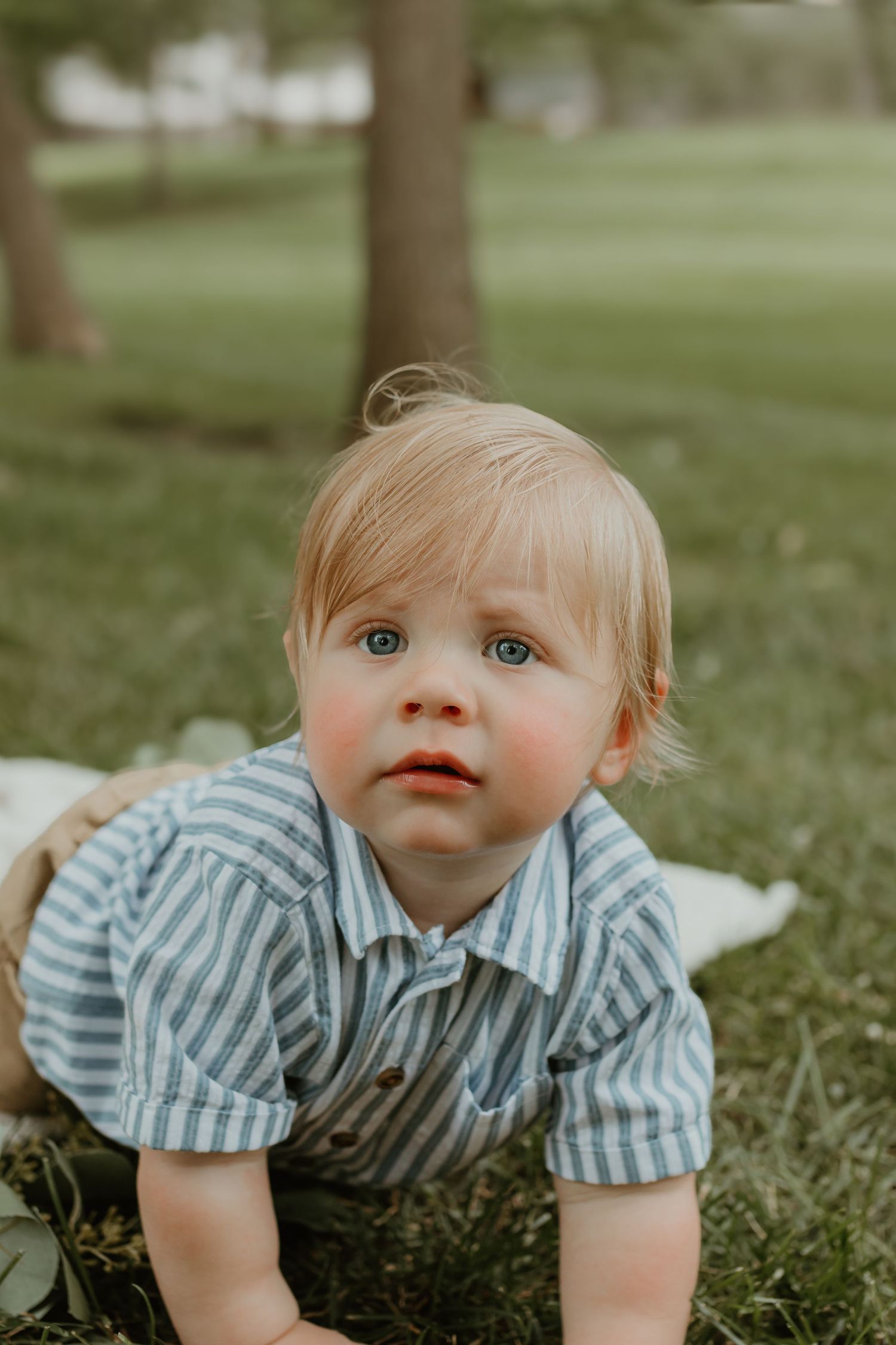A close-up outdoor portrait with soft natural lighting and striped clothing. Colorado Springs Photographer.