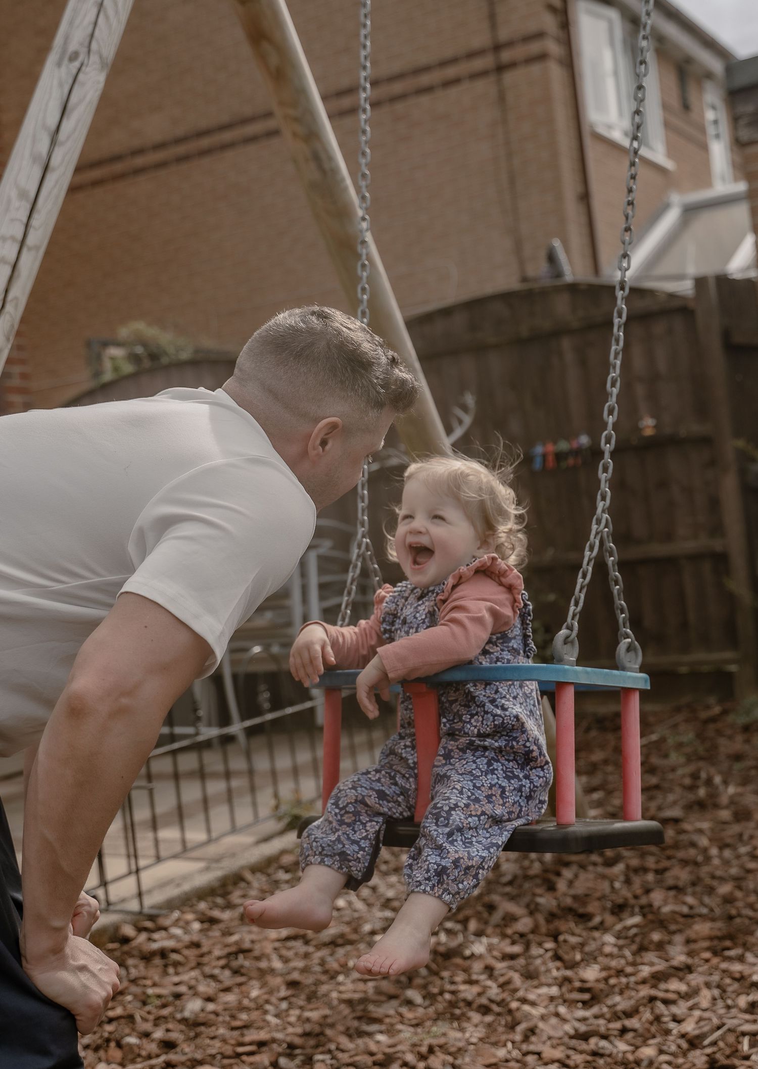 family-photographer-east-midlands-sibling-laughs.jpg