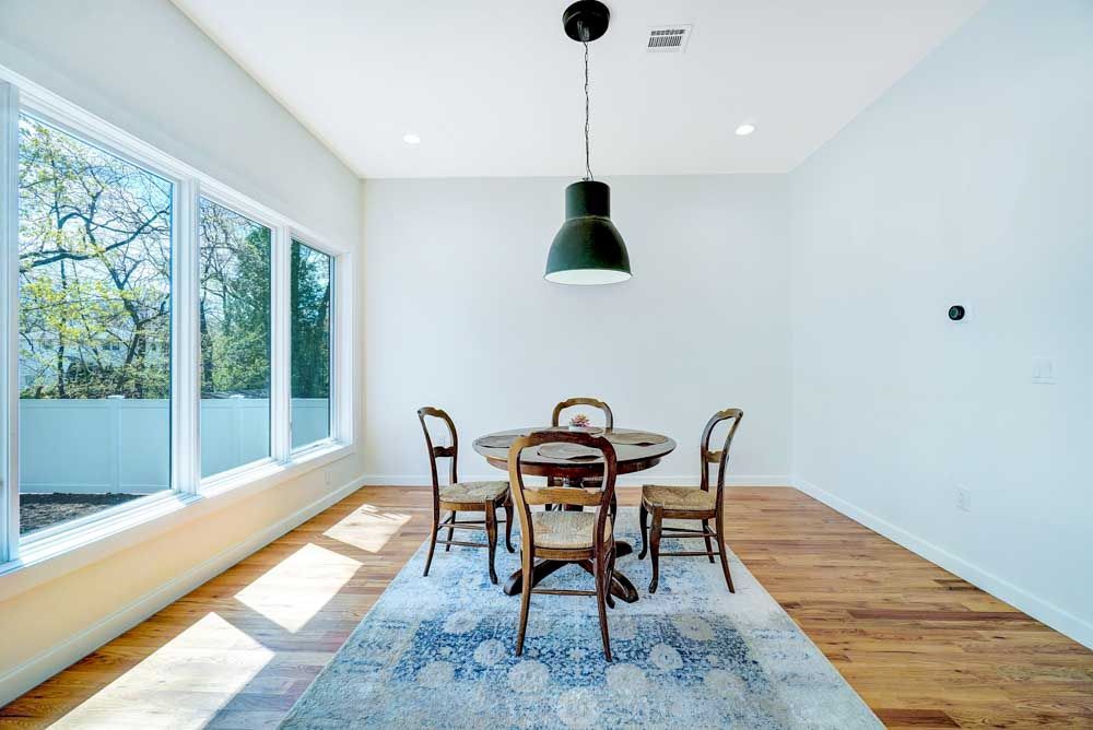 Professional Luxury Real Estate Photography Interior Dining Room with Large Windows