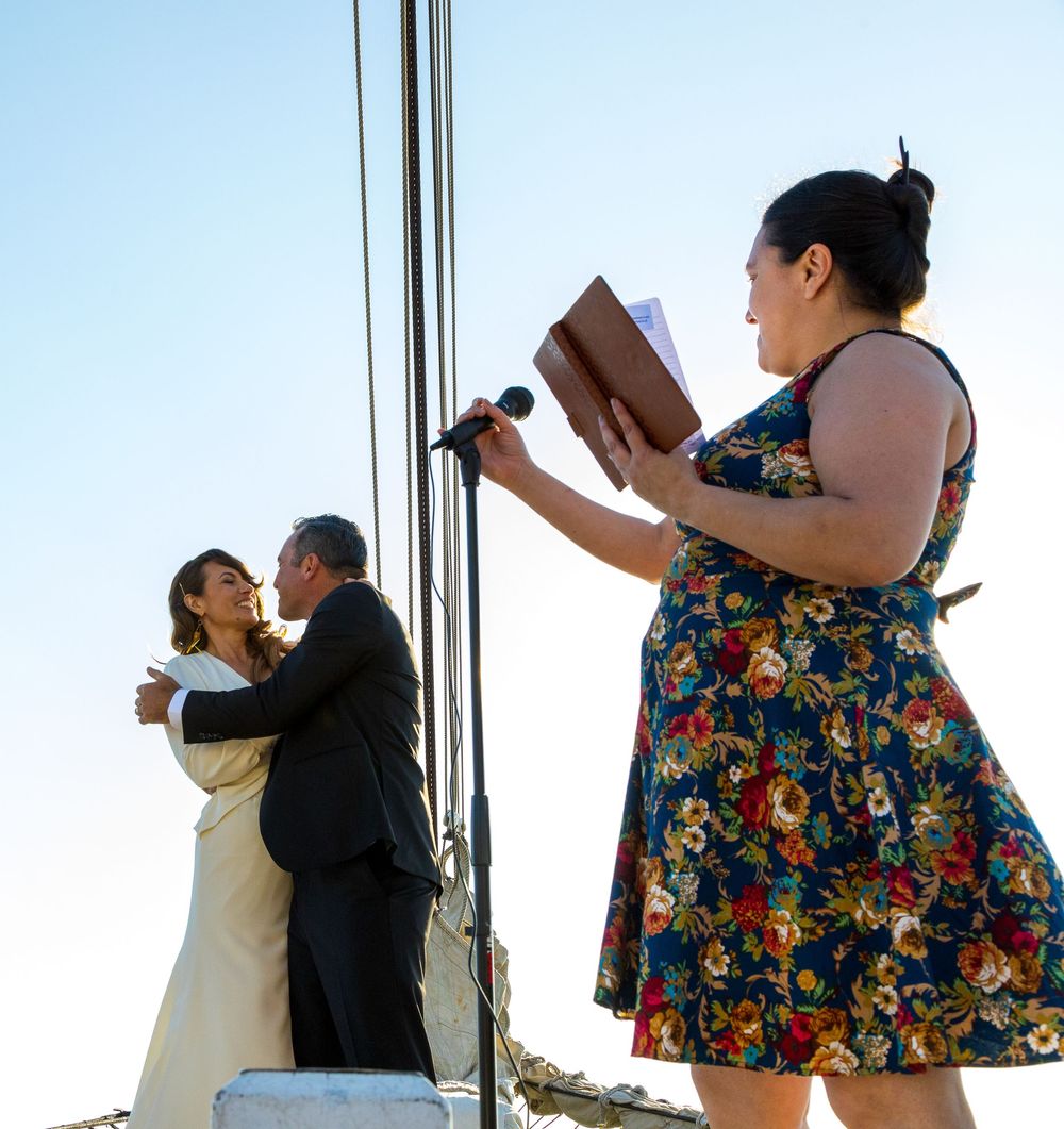 Two people stand against a bright background in a sequence of candid interaction photos.