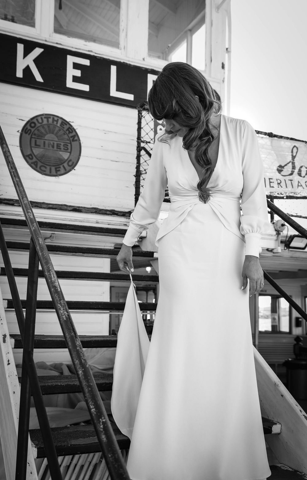 Black and white photo sequence showing someone in a white dress climbing up wooden stairs.