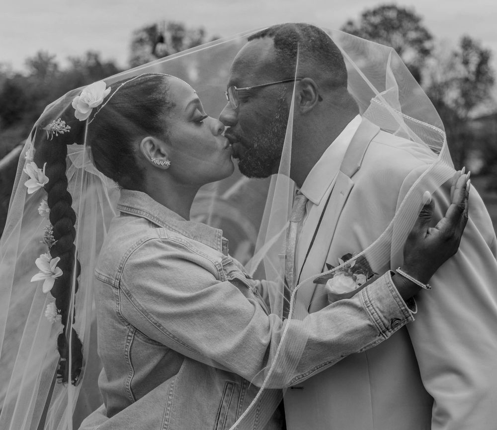 Black and white wedding photography series capturing intimate moments between couples during first dance.