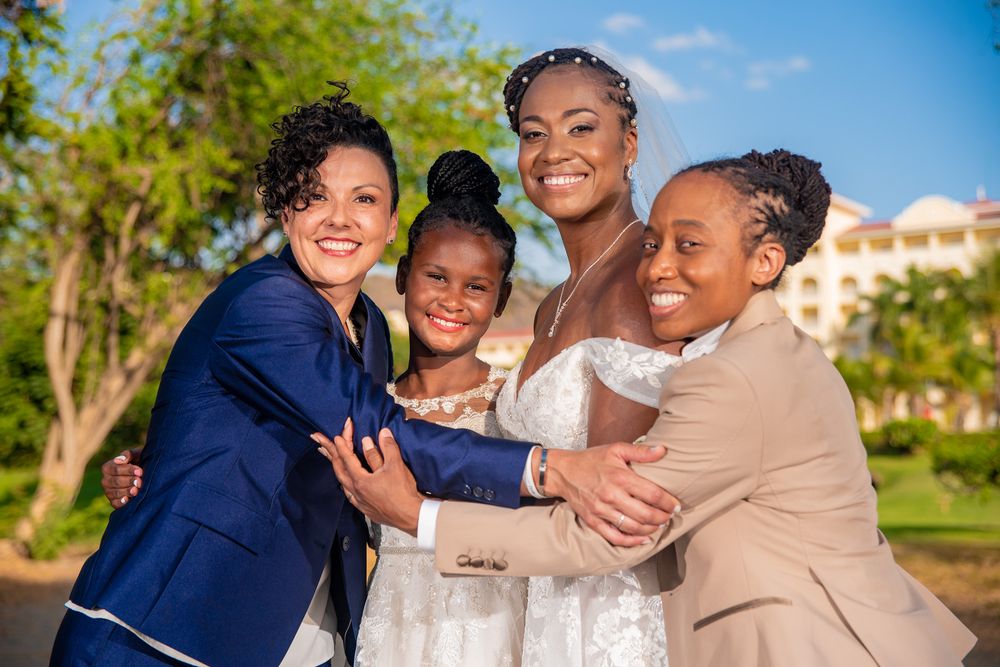 Family members in Wedding photoshoot on the beach in Riu Place, Guanacaste, Costa Rica
