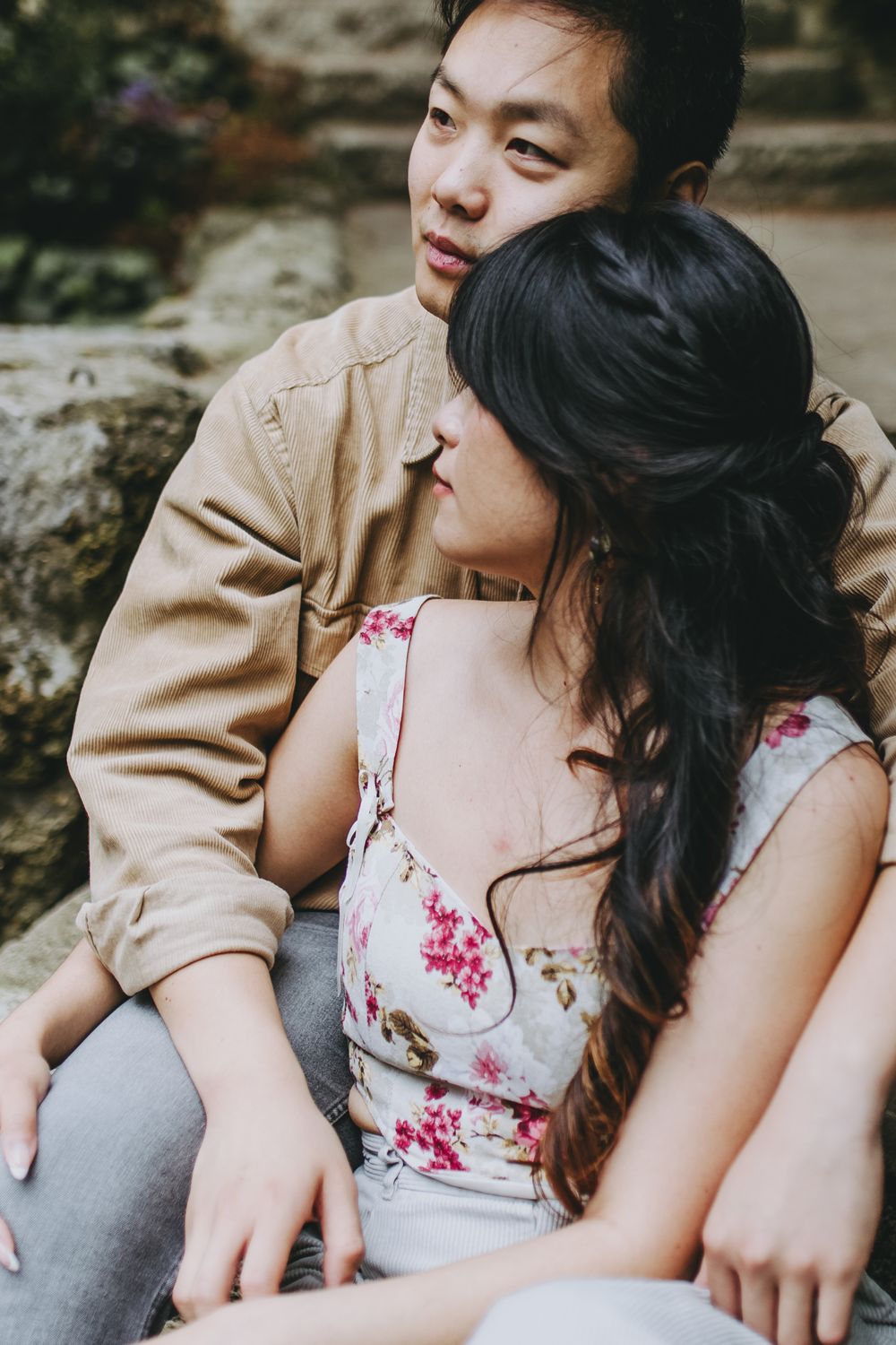 Candid moments of a couple in coordinated outfits sharing affectionate gestures.