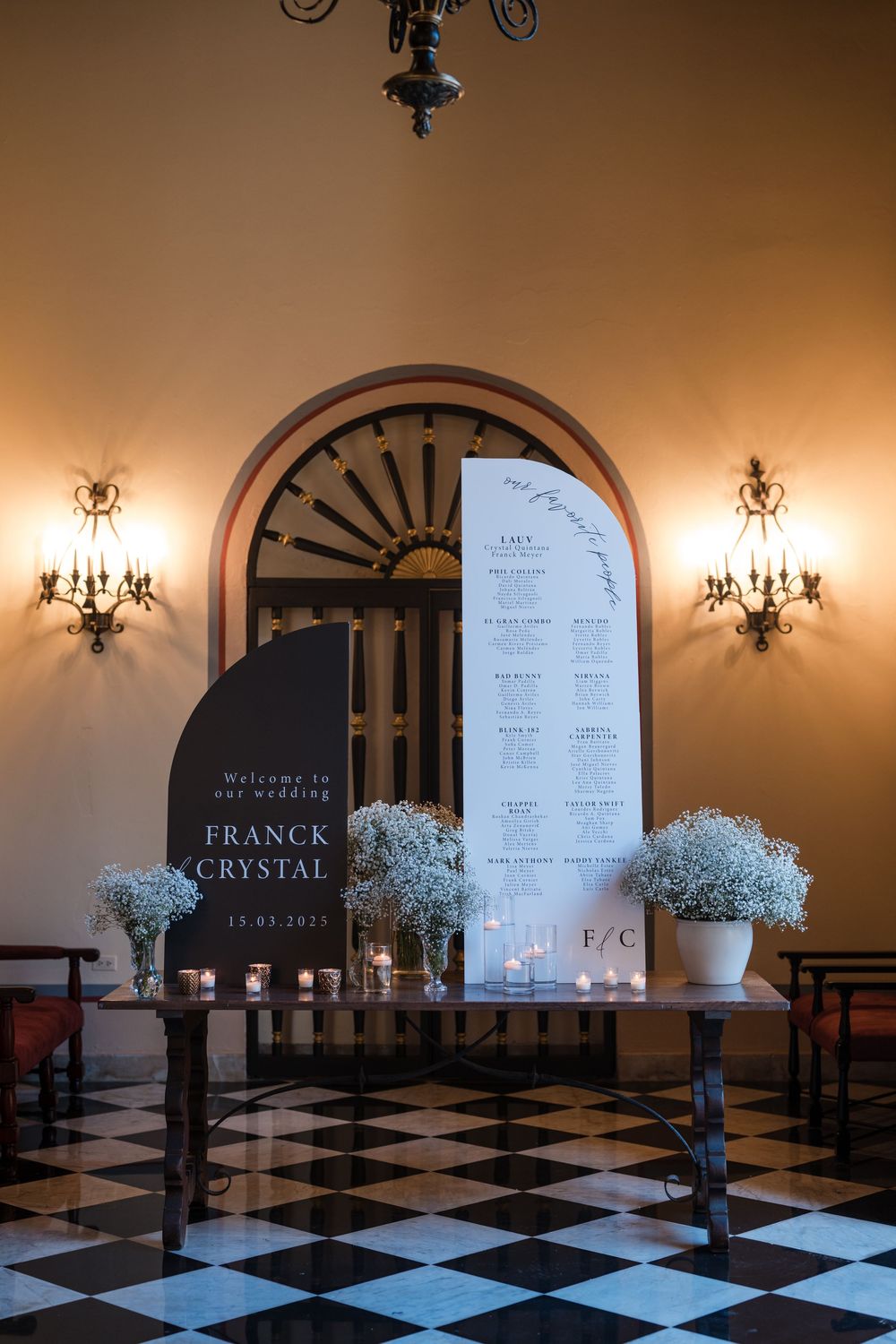 Elegant reception setup with floral arrangements inside Hotel El Convento ballroom in Old San Juan