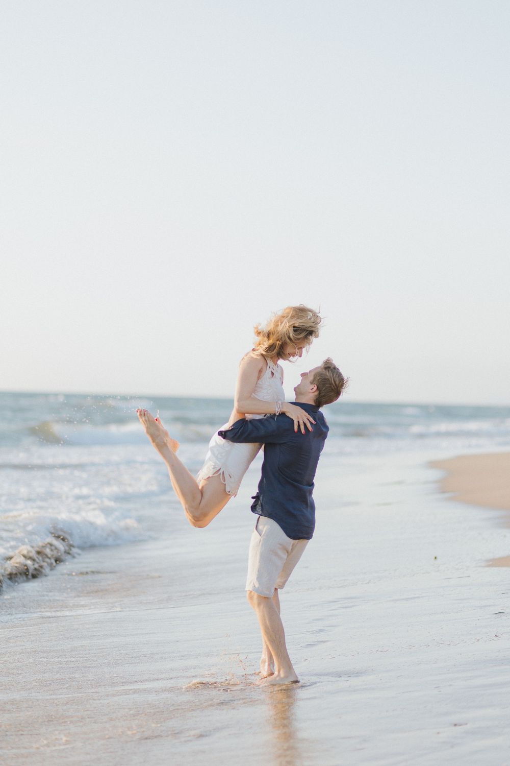 Couple embracing during a romantic photoshoot