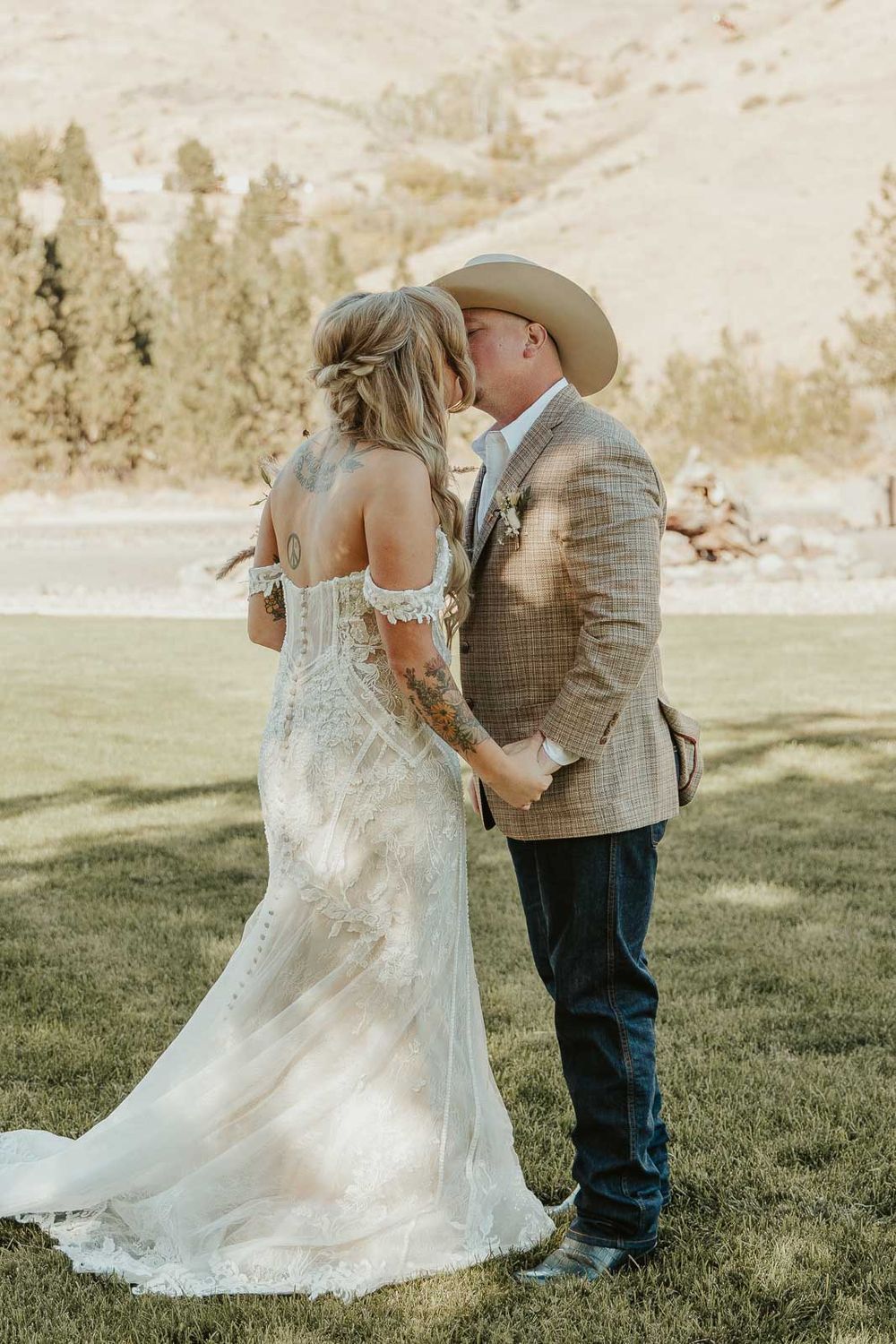 joy, love, and rustic country details at the American Homestead. Photographed by a Spokane wedding photographer. Bride and Groom portrait