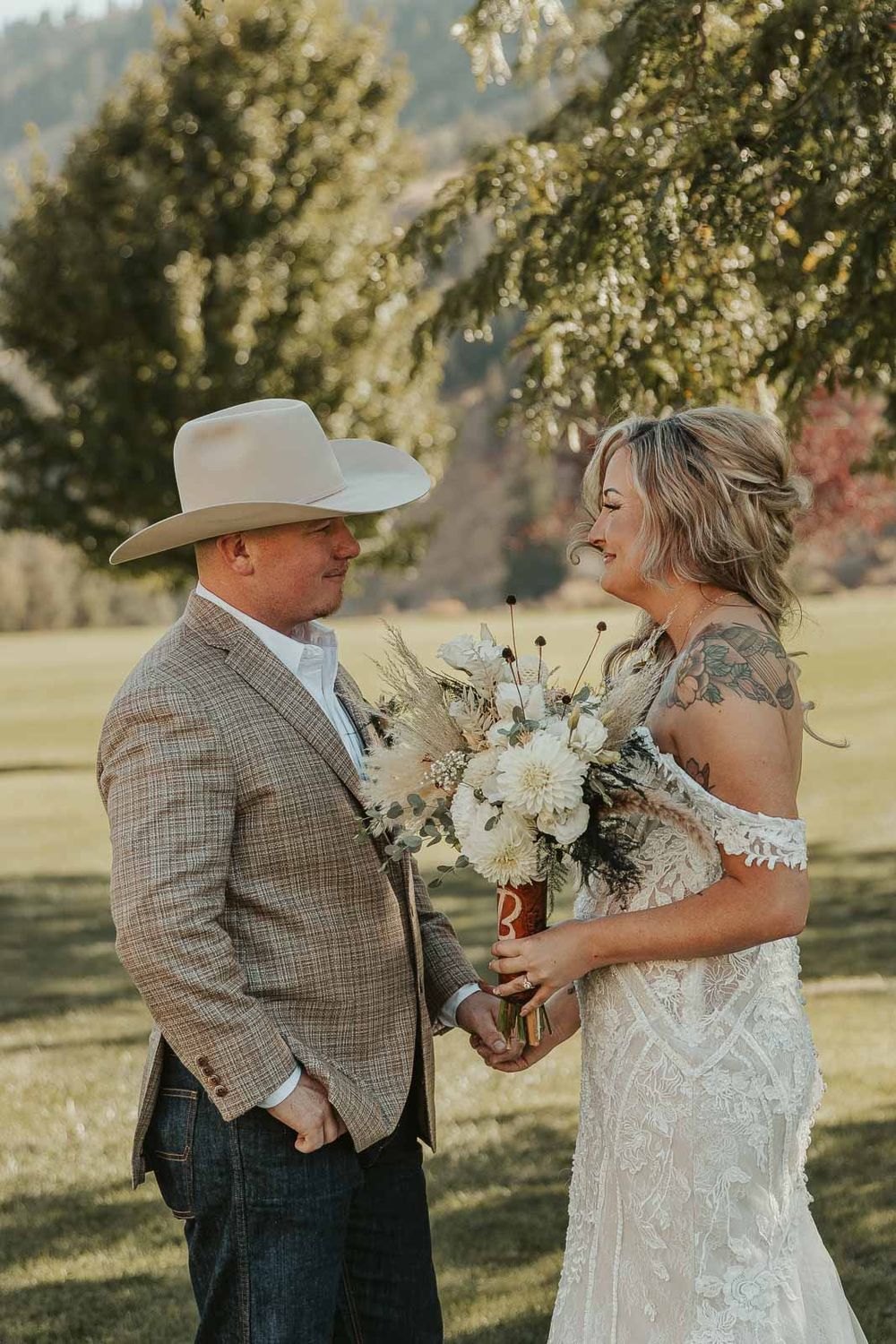 A beautiful first look as Cody and Jessica see each other before the ceremony, emotions overflowing. Spokane wedding photographer