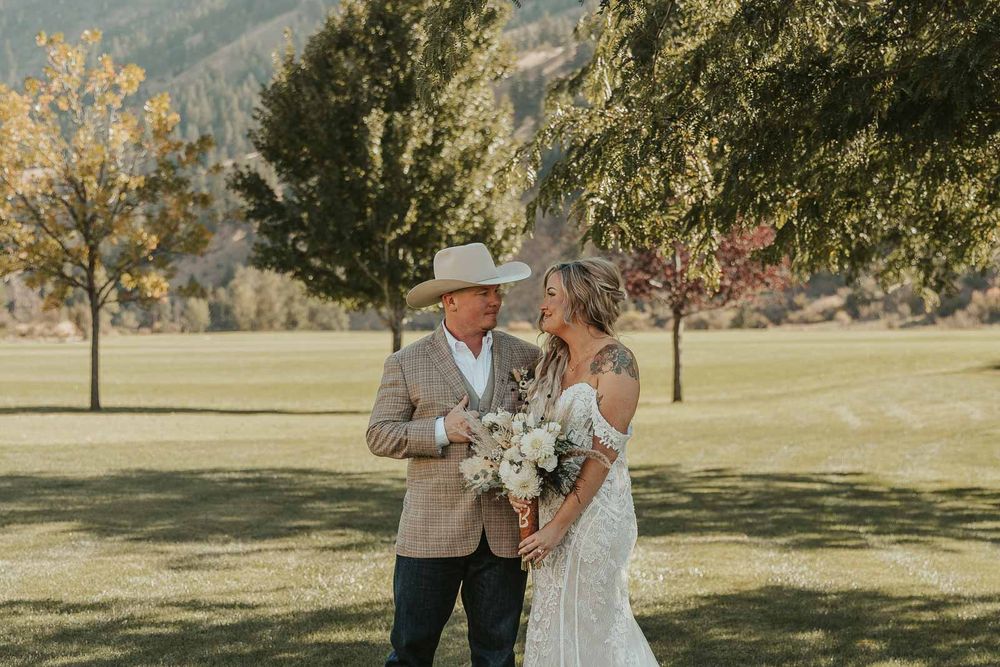 joy, love, and rustic country details at the American Homestead. Photographed by a Spokane wedding photographer. Bride and Groom portrait
