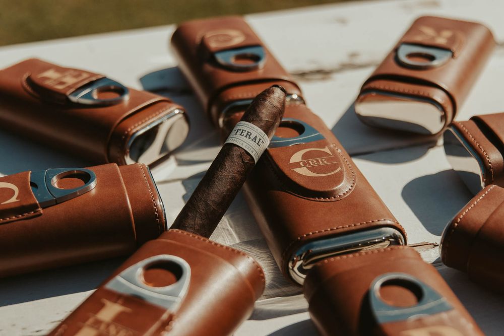 Wedding day cigars, including floral arrangements, decor, and accessories, at a countryside celebration. Photographed by a Yakima wedding