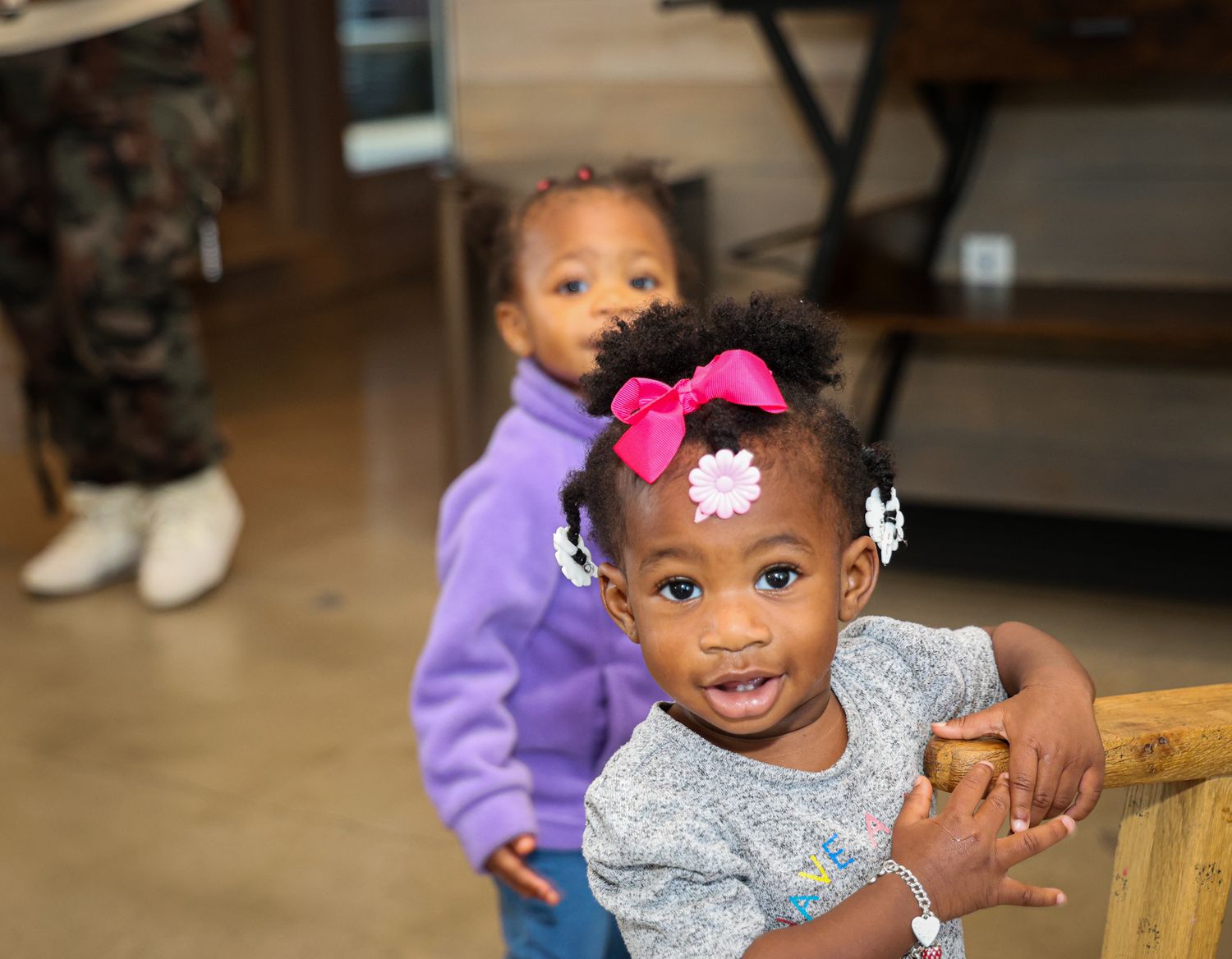Children enjoying a celebration in a decorated indoor space.