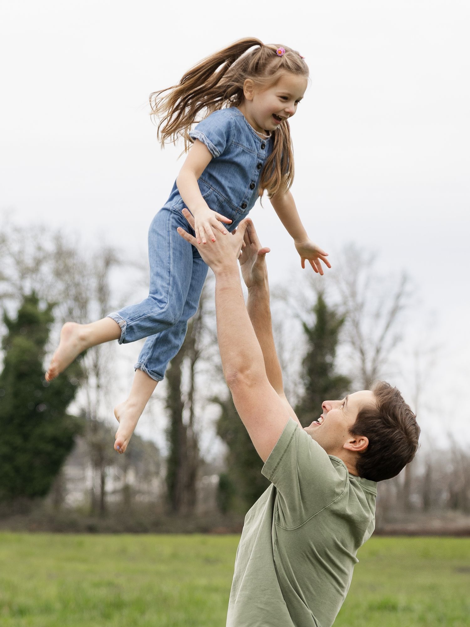 A joyful family moment captured showing pure happiness and connection.