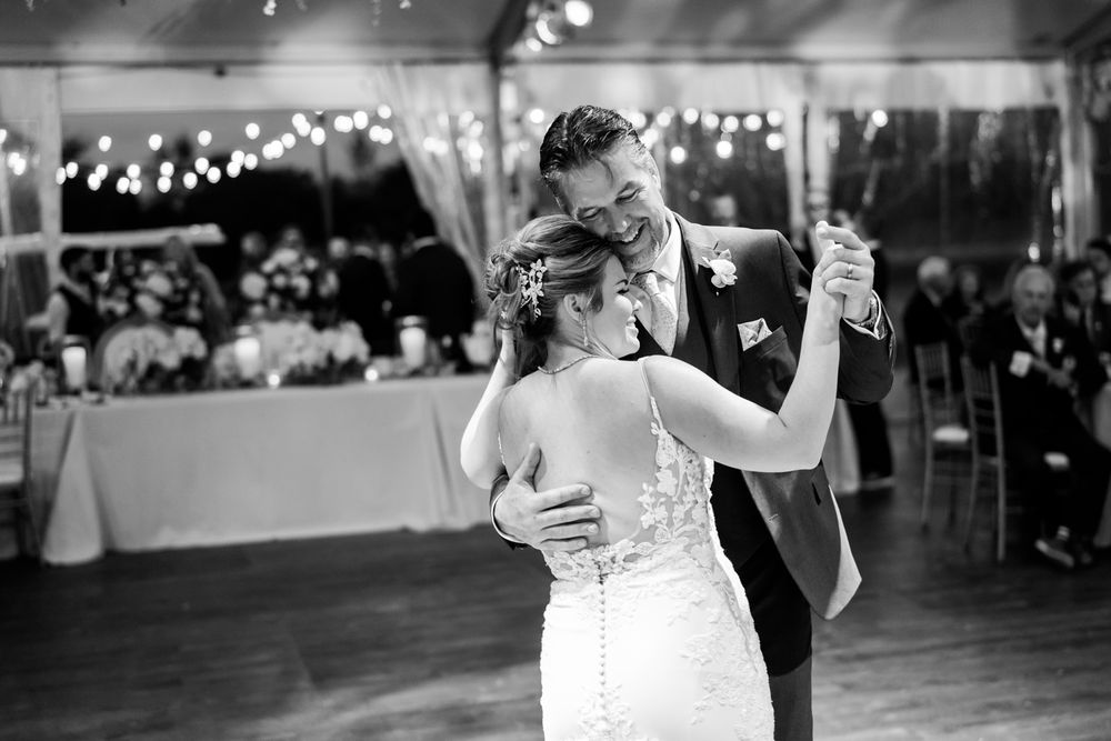 First dance of bride with her dad at their backyard reception.