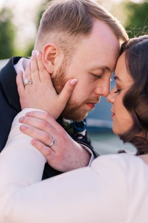 Intimate close-up shots of a tender moment between newlyweds.