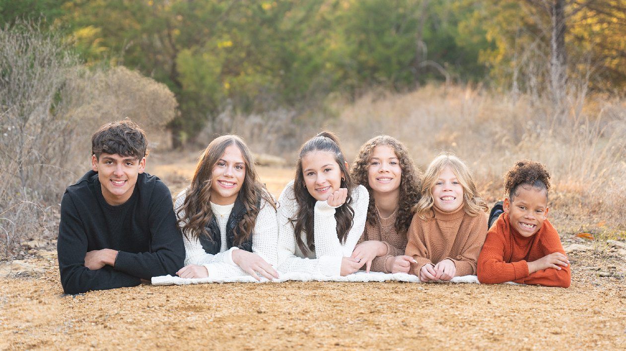 Family of 8 Late Fall Session with Evergreens by Bartlesville Photographer Kristi Bray