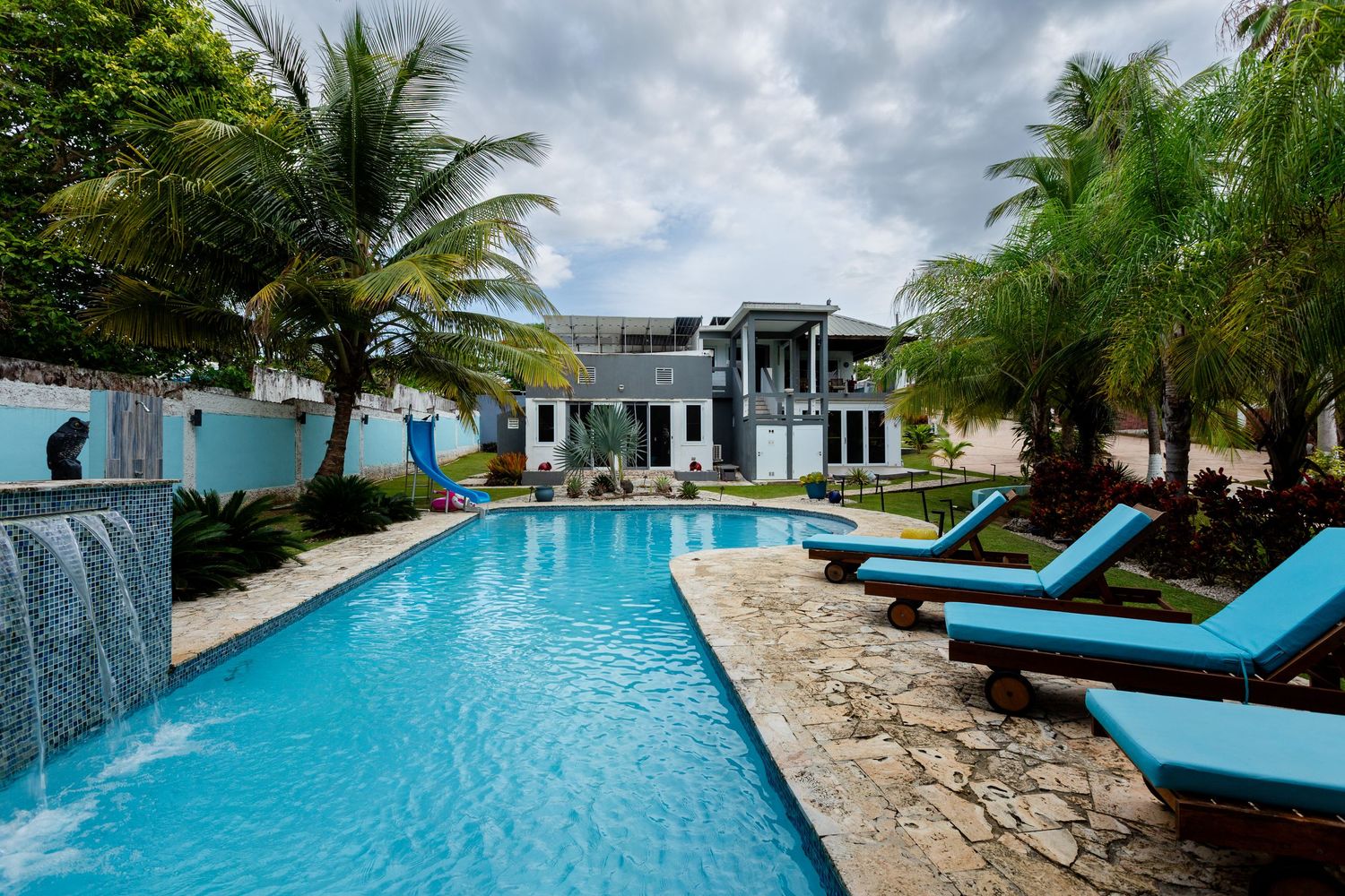 Pool area and side of house. Beach house in Vega Baja, Puerto Rico.
