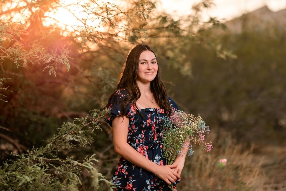 Senior destination session in the desert at sunset Tucson, AZ with monsoon sky's