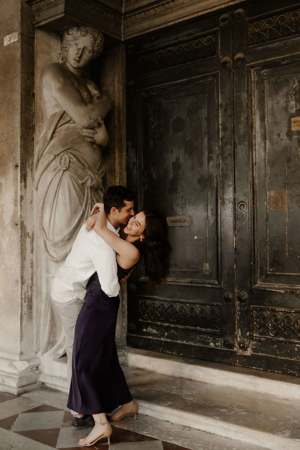 Close up portrait of a romantic couple in Piazza San Marco, professional destination wedding photographer.
