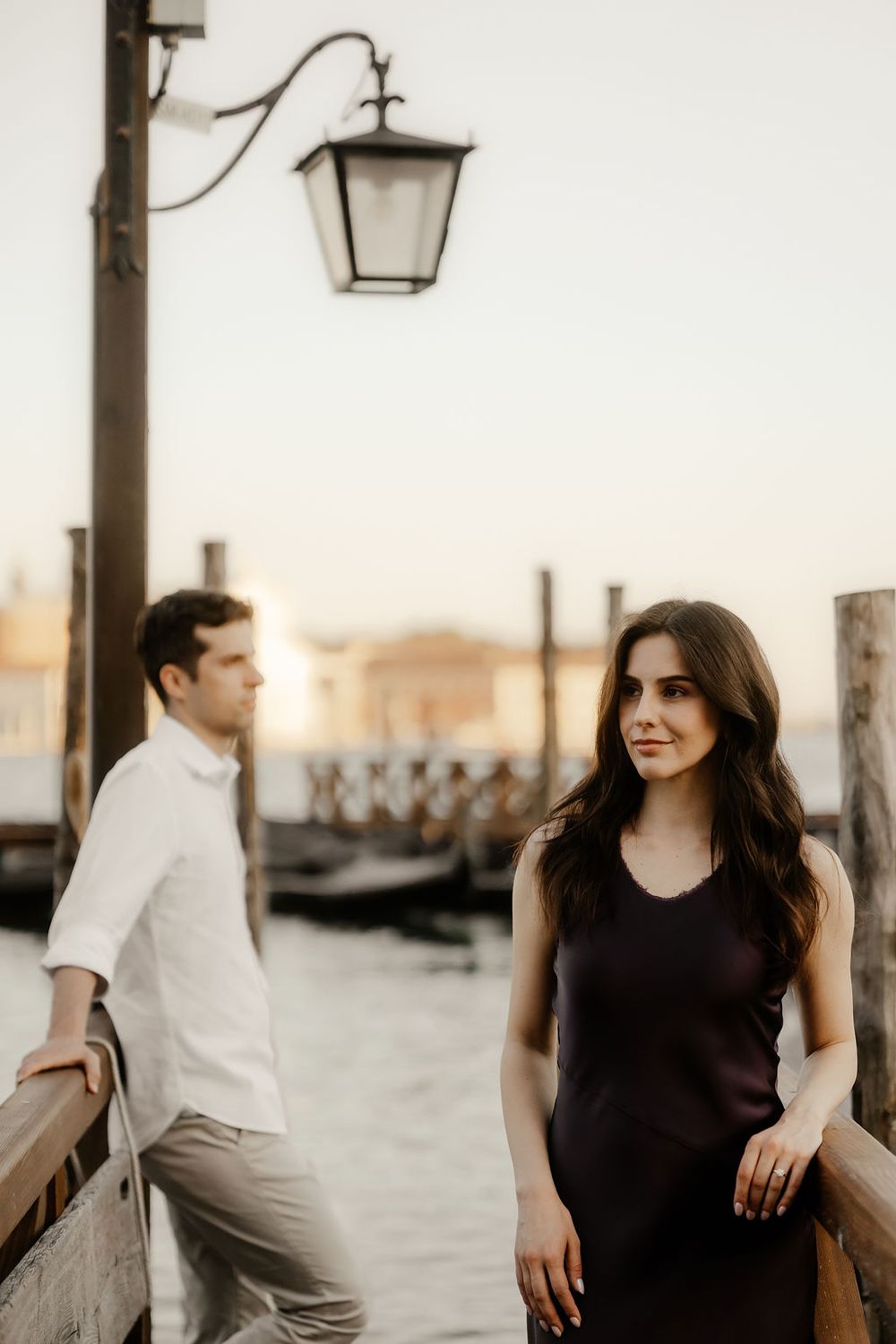 Atmospheric pre-wedding session in Venice at dusk with San Giorgio island in the background.