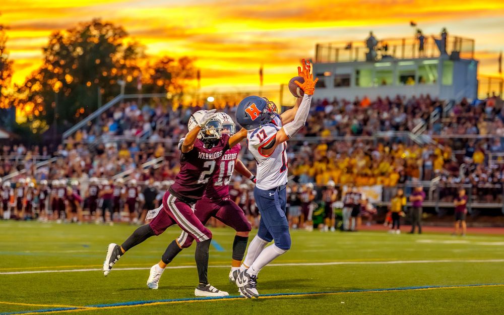 High school football game day action at sunset, Central PA, by Deanna Fox, SportsFox Photography, Hershey PA