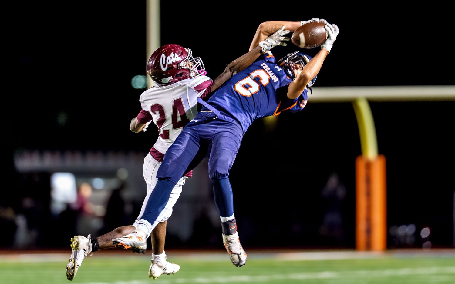 High school football receiver leaping catch game day action photography, Central PA, by Deanna Fox, SportsFox Photography, Hershey PA