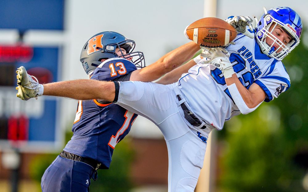 High school football game day action defensive play, Central PA, by Deanna Fox, SportsFox Photography, Hershey PA