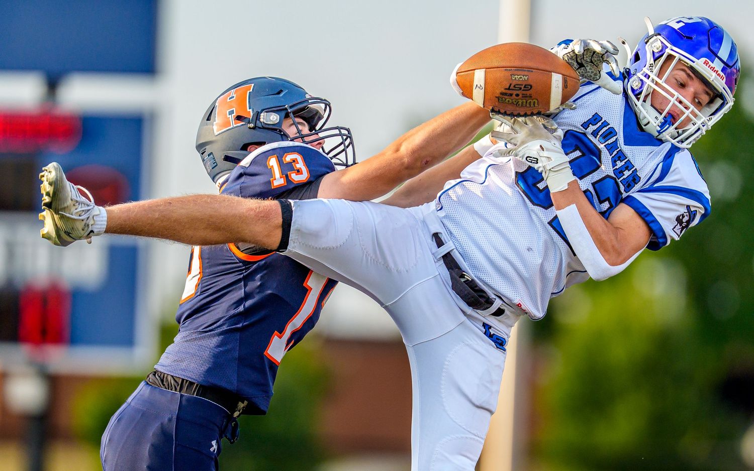 High school football game day action defensive play, Central PA, by Deanna Fox, SportsFox Photography, Hershey PA