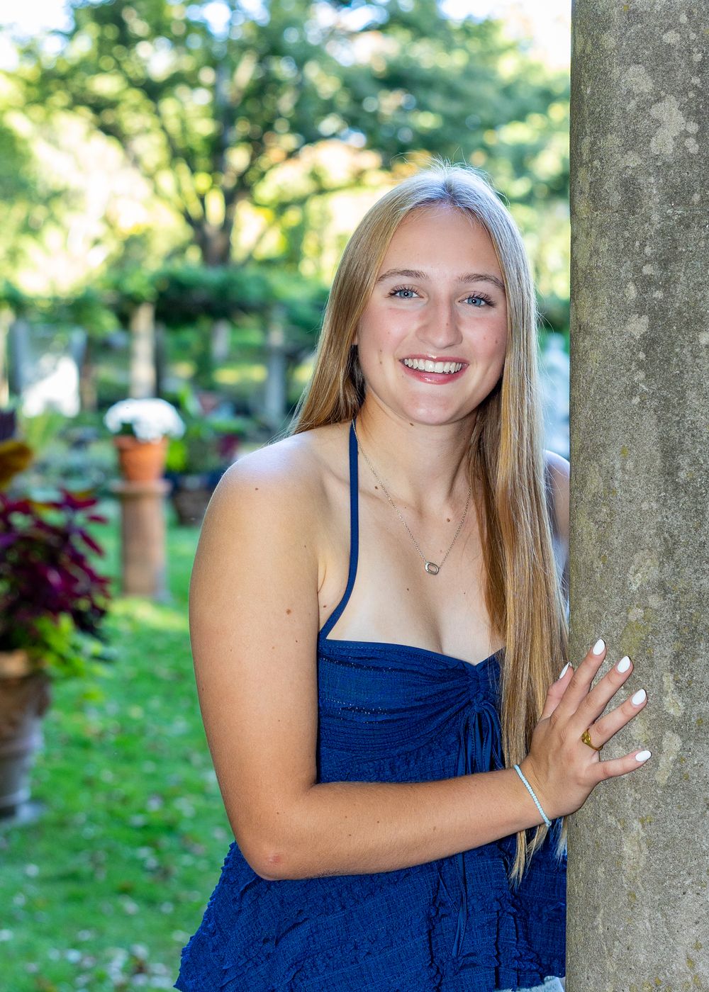 High school senior from Lincoln Sudbury High School yearbook photos in a beautiful garden.  Serving Wayland High school and Weston High.