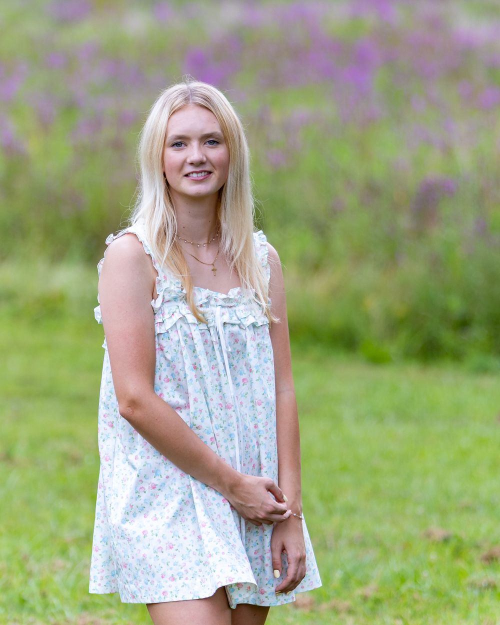 High school senior from Lincoln Sudbury poses for yearbook photos in a wildflower field.  Serving Wayland High School and Concord Carlisle .