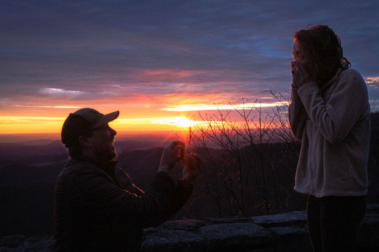 Photo of Dan Seymour of Seymour Photography proposing to his wife.