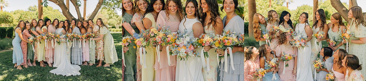 Bridal party in mismatched pastel gowns holding colorful bouquets poses outdoors at a sunny garden wedding celebration.