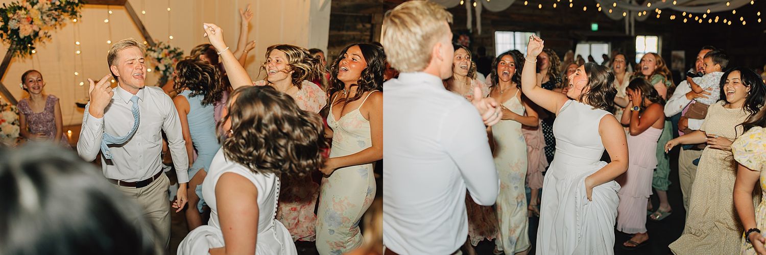 Guests dancing joyfully at a wedding reception, with the bride and groom celebrating on the dance floor.