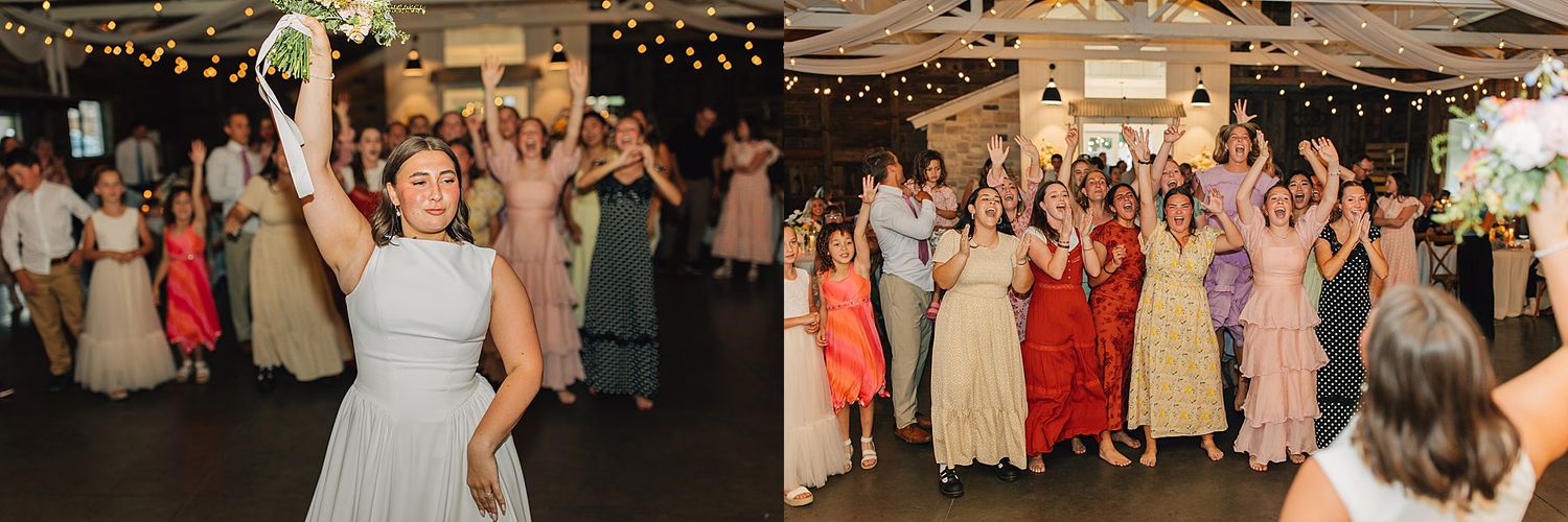 Bride tosses bouquet to excited wedding guests gathered in a decorated reception hall with string lights.