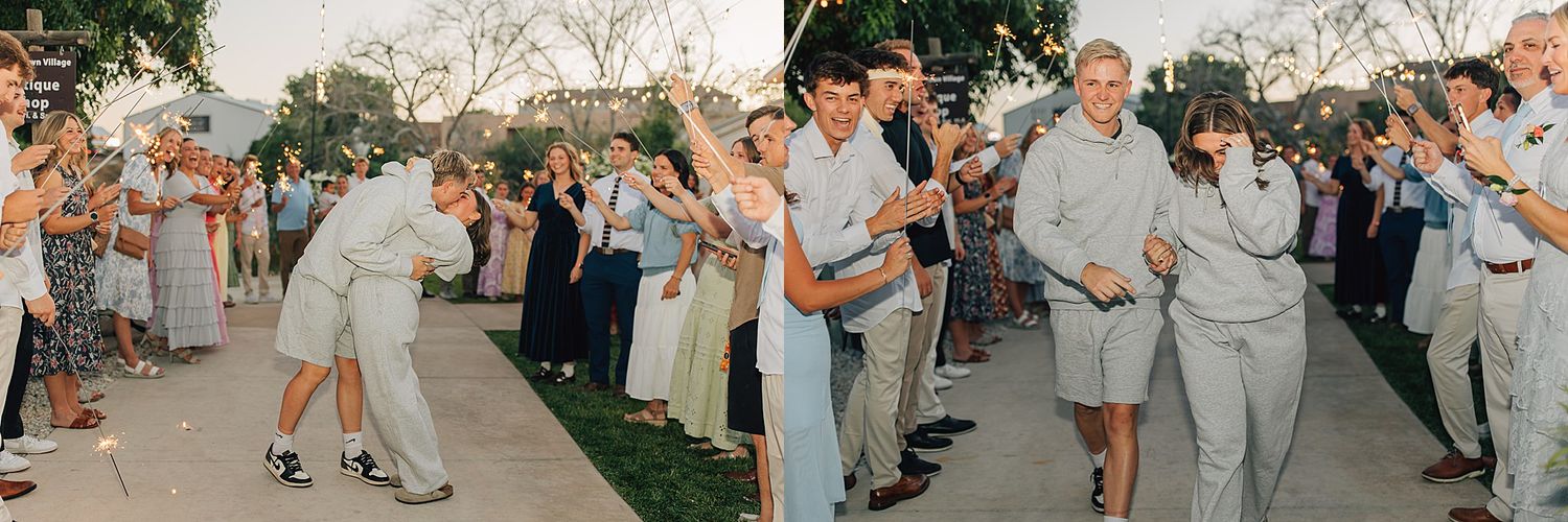 Wedding couple celebrates joyful sparkler exit with guests lining the outdoor ceremony pathway.