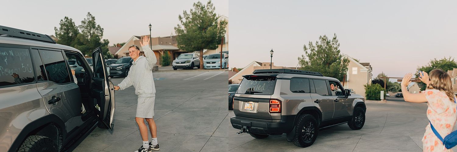 Two people loading gear into SUVs in a parking lot at sunset during an outdoor road trip adventure.