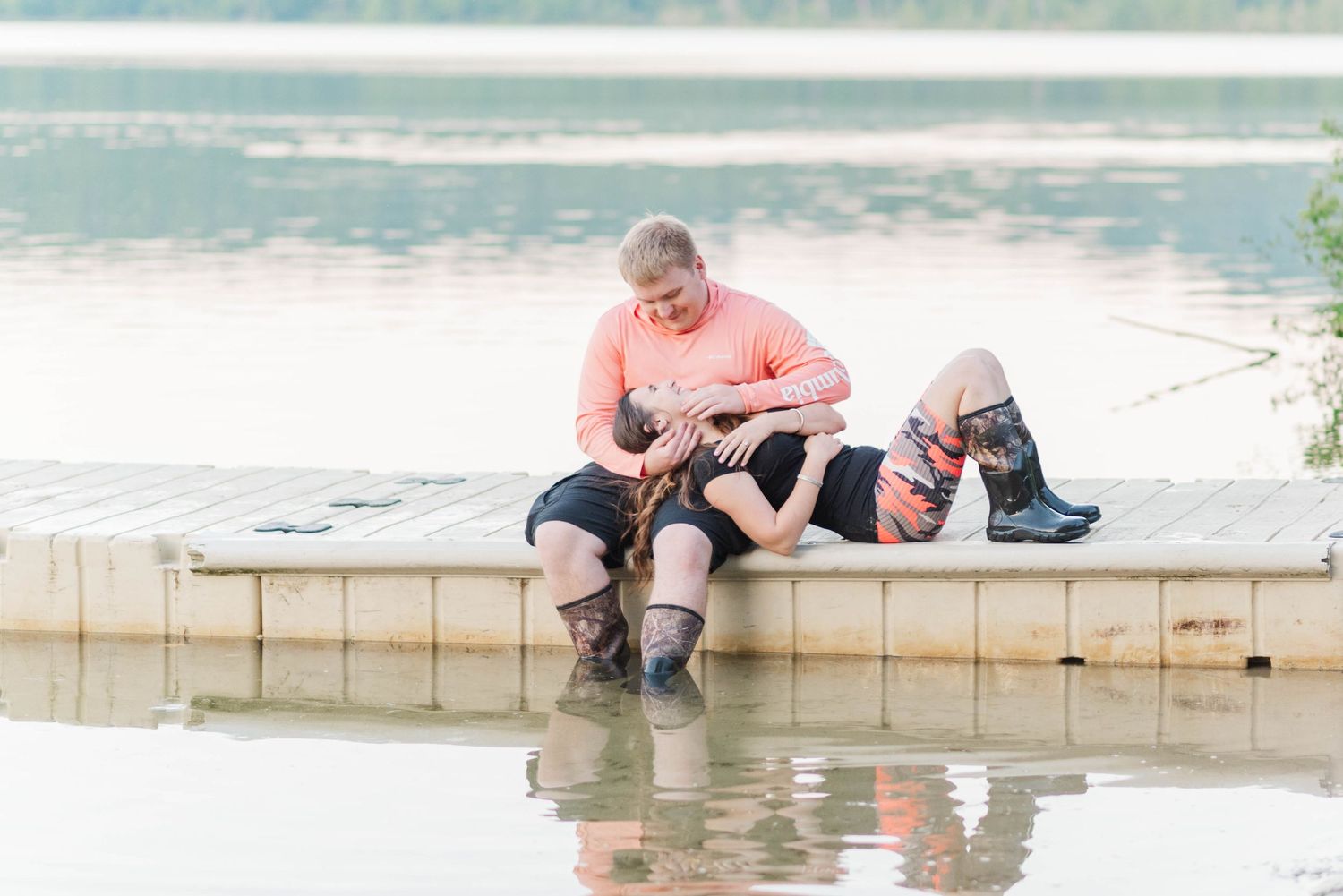 Engagement session at Quemahoning Reservoir in Johnstown, Pennsylvania, intimate pose on the dock