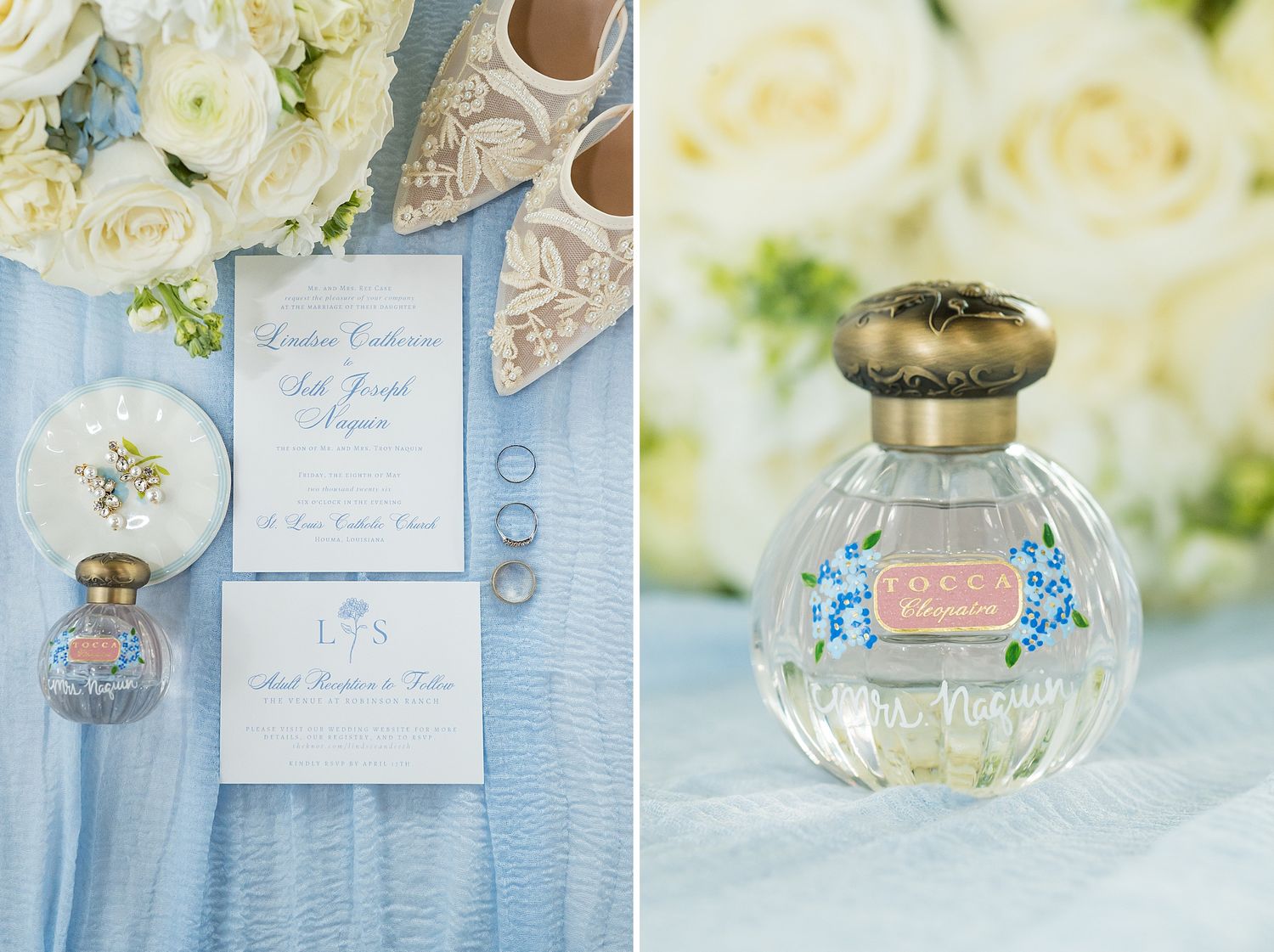 Blue wedding stationery suite with rings, perfume bottle, and white floral arrangements on light blue fabric.