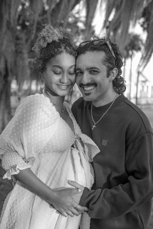 Intimate black and white maternity photos captured outdoors.