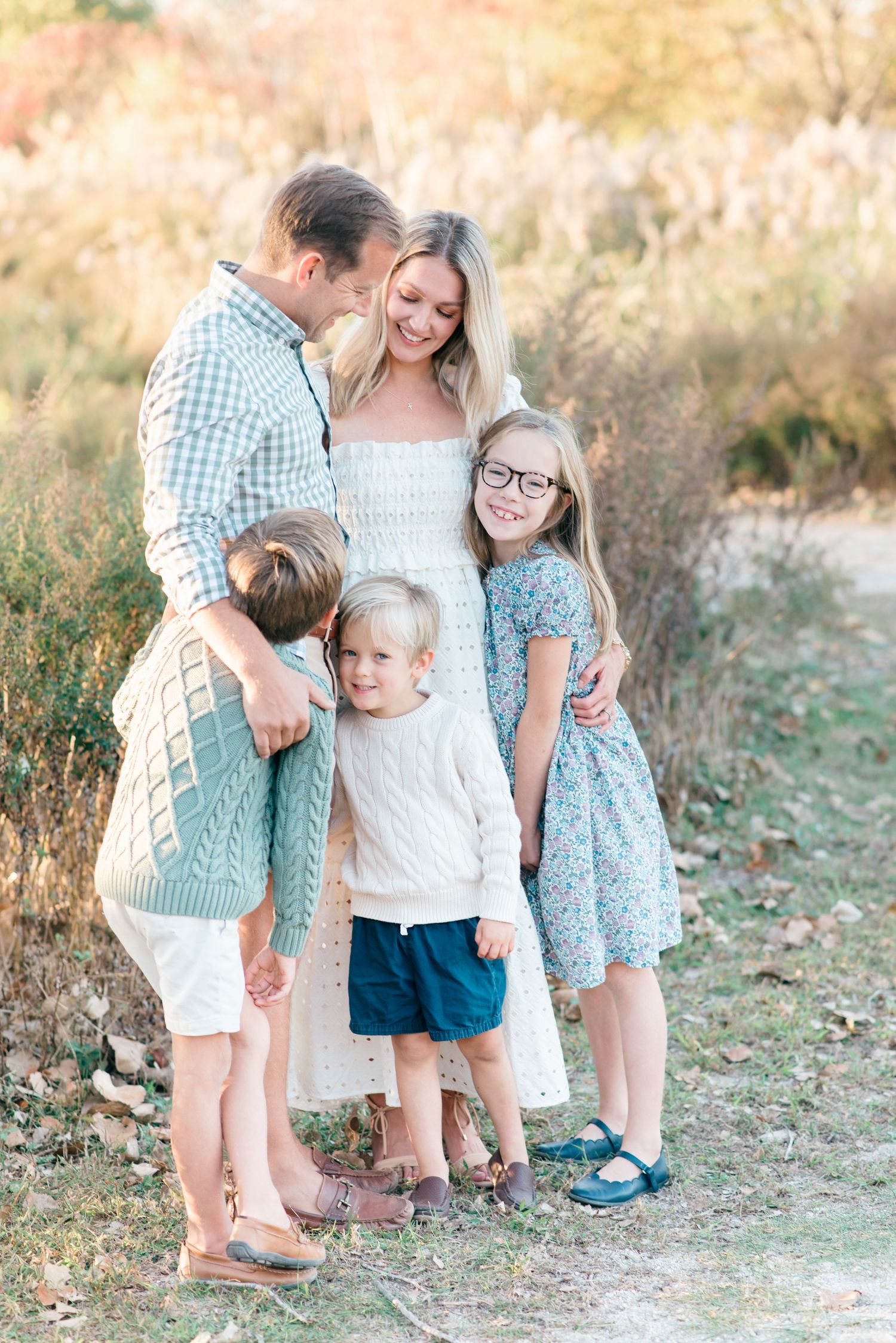 A peaceful moment as a family  at Manasquan Beach, New Jersey, dressed in fall layers and soft knits.